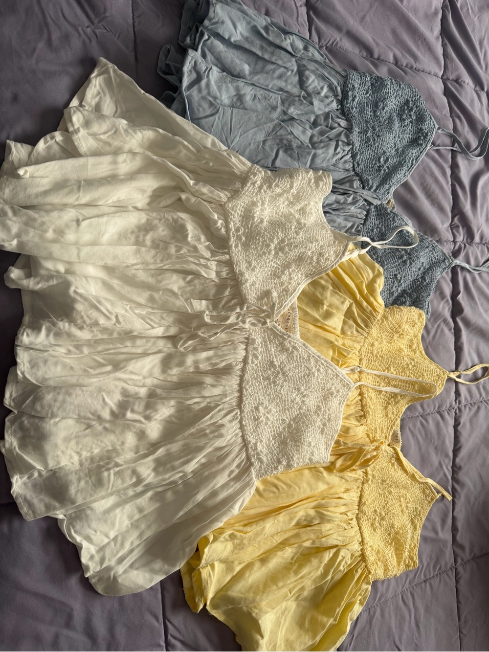 Set of Three Smocked Spaghetti Strap Sundresses — White, Yellow, Light Blue